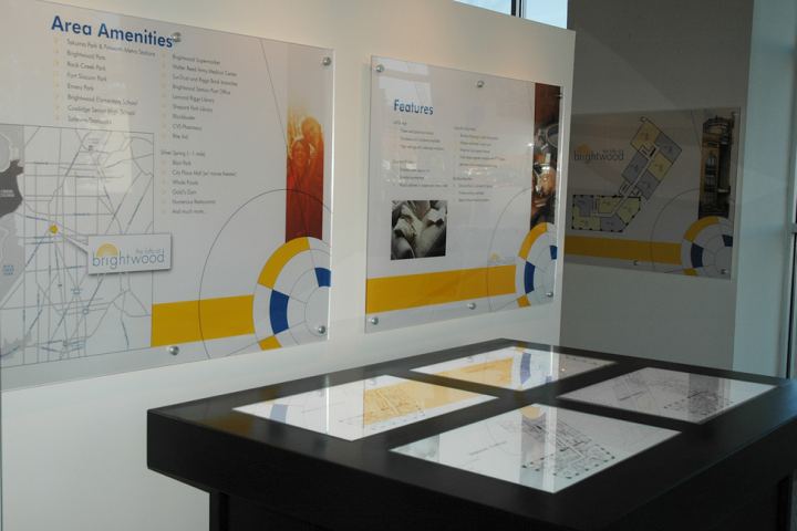 Signage project: sales office displays with custom backlit tables